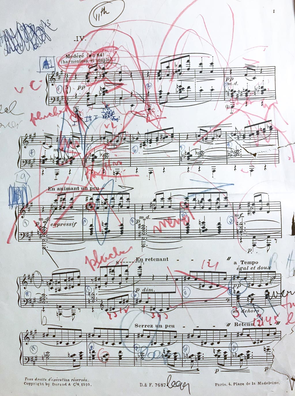 A page of music manuscript (Debussy prelude) with instructional markings in various colors, by Harold Zabrack.